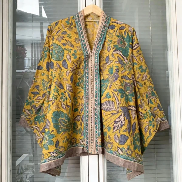 sg-11134201-820oj-mne0i4ks17gk34.webp Premium Batik Kebaya Top – Trendy Office Wear for Women
